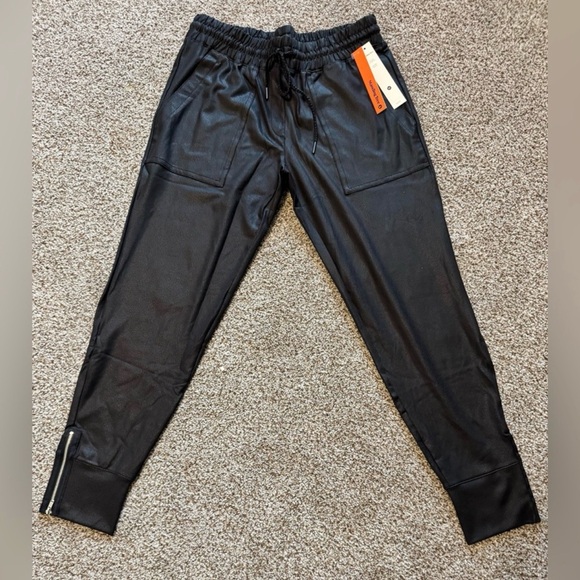 Standing Tree Pants - Standing Tree Black Joggers with zippers at the ankle
NWT
Never worn.